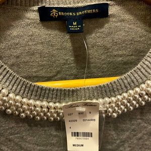 Brand new sweater with pearls around neckline